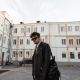 stylish-portrait-young-man-with-hairstyle-fashion-sunglasses-cool-leather-black-jacket-with-trendy-backpack-city-street-urban-hipster-guy-youth-wear-american-style-outdoors